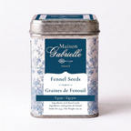 A metal tin of Maison Gabrielle Fennel Seeds (Egyptian fennel) on a clean white background. The tin has a silver metal lid and base, with a label featuring a blue and white toile pattern and dark blue text panels.